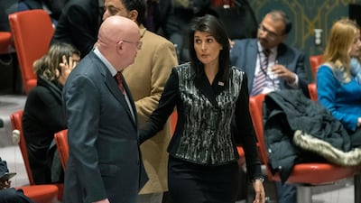 Russian ambassador to the United Nations Vasily Nebenzya, left, speaks to US ambassador to the United Nations Nikki Haley before a Security Council meeting on Iran, Friday, Jan. 5, 2018, at United Nations headquarters. Mary Altaffer / AP Photo