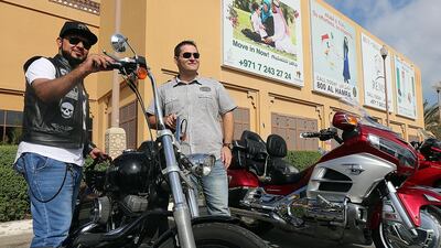 Fareed Al Hammadi, left, with Dr Talal Mouzaek at a cafe in Ras Al Khaimah on January 5, 2017. Satish Kumar / The National