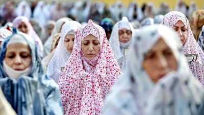 Iranian women pray during the Eid Al Fitr prayer in Tehran, Iran. Eid al-Fitr marks the end of the holy month of Ramadan, during which Muslims all over the world fast from sunrise to sunset. Ebrahim Noroozi / AP photo