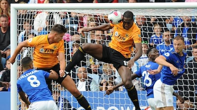 Leander Dendoncker sees his header hit the arm of Wily Boly during Wolves' Premier League game against Leicester City and his subsequent goal disallowed. AP