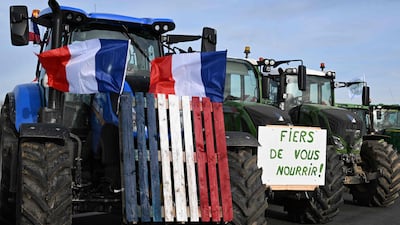 Tractors block a road as farmers protest on a motorway near Jossigny, east of Paris. AFP