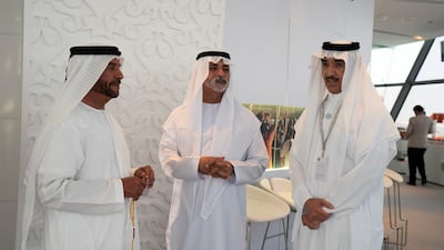 (L-R) Sheikh Saif bin Mohamed Al Nahyan, Sheikh Nahyan bin Mubarak Al Nahyan, UAE Minister of State for Tolerance and Ahmed Juma Al Zaabi, UAE Deputy Minister of Presidential Affairs, attend the final day of the 2018 Formula 1 Etihad Airways Abu Dhabi Grand Prix, in Shams Tower. Ryan Carter / Ministry of Presidential Affairs