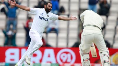 India's Mohammed Shami celebrates the dismissal of New Zealand batsman BJ Watling for one.