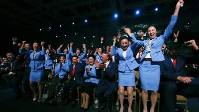 Members of the delegation from Beijing 2022 Winter Olympics candidate city react after the city was elected to host the 2022 Olympic Winter Games. Vincent Thian / AP Photo