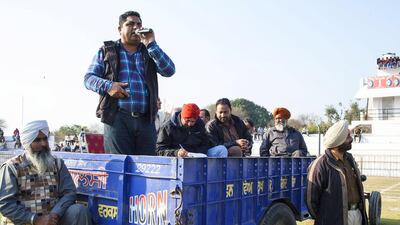 A ltractor trailor serves as a stage for the commentary team and other sport officials.