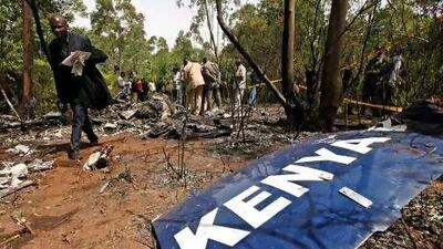 The wreckage of the crashed helicopter is being inspected by police officers in a forest near Ngong town, on the outskirts of the capital Nairobi.