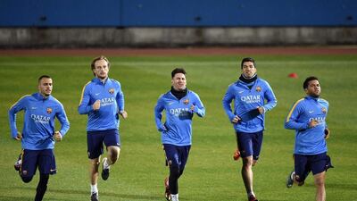 Barcelona players Aleix Vidal, Ivan Rakitic, Lionel Messi, Luis Suarez and Dani Alves shown at training on Monday. Franck Robichon / EPA