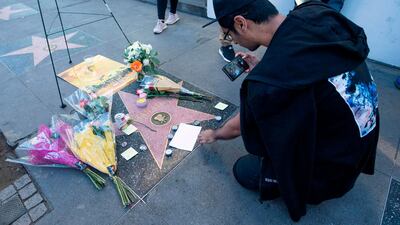Fans leave tributes on Stan Lee's star on the Hollywood Walk of Fame. AFP