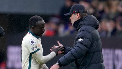 Liverpool's manager Jurgen Klopp with Sadio Mane. AP