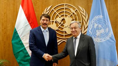 Hungary's President Janos Ader, left, meets with United Nations Secretary-General Antonio Guterres during the 74th session of the U.N. General Assembly, at U.N. headquarters. AP Photo