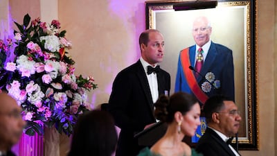 Jamaica's Prime Minister Andrew Holness and Kate listen as Prince William delivers a speech at King's House, Jamaica. PA