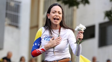 Maria Corina Machado planned to run for president against Nicolas Maduro in 2023 after sweeping the primaries, but the Venezuelan government barred her from the ballot. AFP