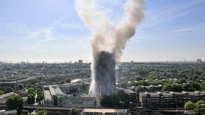 Smoke billows from a fire in Grenfell Tower in west London on June 14, 2017. PA