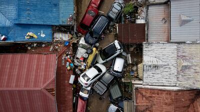 Cars are piled up after being swept away in floods brought on by Typhoon Kalmaegi in Cebu City, in the Philippines. Reuters