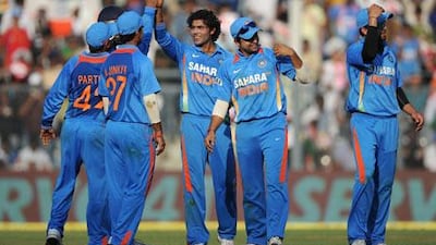 Ravindra Jadeja, centre, has enjoyed an impressive series so far against England, seen here dismissing Ravi Bopara during the fourth one-day international in Mumbai yesterday.