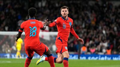 Mason Mount, right, celebrates after scoring. AP