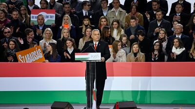 Hungarian Prime Minister Viktor Orban addresses a crowd at a rally marking 65 years since an anti-Soviet uprising in Communist-era Hungary. EPA