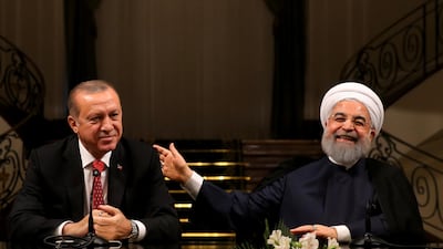 Turkish president Recep Tayyip Erdogan, pictured here with Iranian president Hassan Rouhani during a joint press conference at the Saadabad Palace in Tehran on October 4, 2017, has warned that Ankara, Baghdad and Tehran could decide together to 'close' the oil taps in Iraq's autonomous Kurdish region. Presidency Press Service / Pool Photo via AP