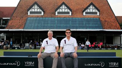 Johan Cruyff and Fabio Capello pose during the Laureus All Stars Unity Cup on Tuesday. Ian Walton / Getty Images / March 25, 2014
