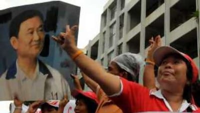 Supporters of Thaksin Shinawatra demonstrate at the Supreme Court in Bangkok yesterday.