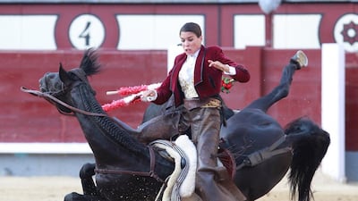 French rejoneadora Lea Vicens is hurled into the air by a bull in Madrid. Alberto Simon / AFP Photo