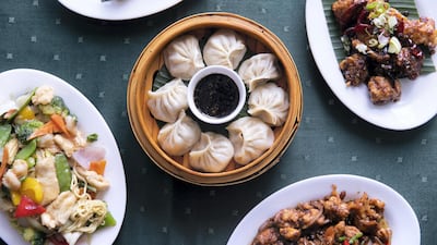Fried wasabi prawns, dry red pepper fish, dry chilli chicken, mixed chow mien noodles and steamed chicken dumplings, served at Imperial Dragon restaurant in Mankhool. R0eem Mohammed / The National