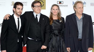 Producer Matthew Budman, director David O Russell and Charles Roven attend the Closing Night premiere of American Hustle. Andrew H. Walker / Getty Images for DIFF
