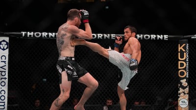 Russia's Umar Nurmagomedov, right, fights with Cory Sandhagen, of the United States, in a bantamweight bout at UFC Fight Night on Saturday, Aug. 03, 2024, in Abu Dhabi, United Arab Emirates. (AP Photo / Altaf Qadri)