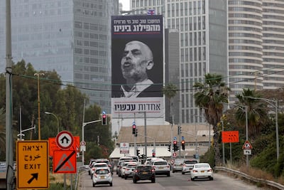 A billboard in Tel Aviv shows Yahya Sinwar, head of Hamas in Gaza, with a message in Hebrew: 'Think well of who benefits from our division - unity now'. AFP