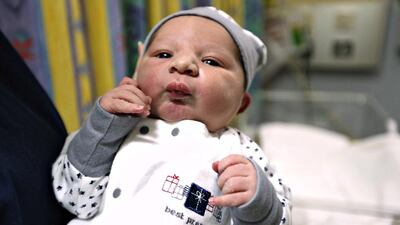 Emirati baby Abdulla Al Mazroui was born nine minutes past midnight on New Year’s day at the Corniche Hospital in Abu Dhabi. Fatima AL Marzooqi/ The National