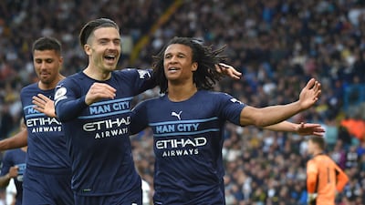 Nathan Ake celebrates with Jack Grealish. AP