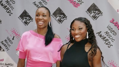 Venus Williams and Serena Williams, in a black dress, attend the 2003 MTV Video Music Awards at Radio City Music Hall on August 28, 2003 in New York City. AFP