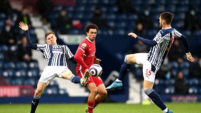 Right-back: Trent Alexander-Arnold (Liverpool) – Took the corner that led to one of the stories of the season, with Alisson heading it in, but had played well before then. PA