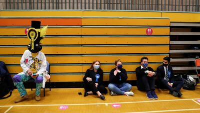 People wait as ballots are counted. Reuters