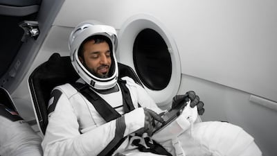 Dr Al Neyadi trains inside a SpaceX Dragon capsule.
