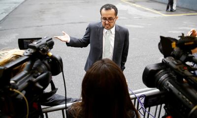 Hamza Al Kamali, member of the delegation of the Government of Yemen talks to the media outside a hotel in Geneva. Reuters
