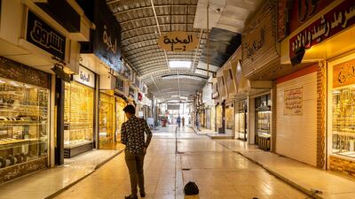 A man walks through the empty gold market during the coronavirus pandemic in Kirkuk, Iraq. On September 4, Iraq recorded 5,036 coronavirus cases, its biggest daily increase since the start of the outbreak. The surge has prompted warnings from Iraq's health minister and WHO that the country could be on the verge of a health crisis as pressure mounts on the already strained healthcare system. Since the first case was recorded in February, Iraq has recorded 252,075 total cases and 7,359 deaths. Getty Images