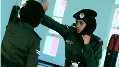 Ruqaya Al Baloushi, a national judo champion and self-defence trainer at the women's police school, in a scene from Veiled Police.
