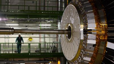 A technician stands near equipment of the Compact Muon Solenoid experience at the Organisation for Nuclear Research in France. Reuters