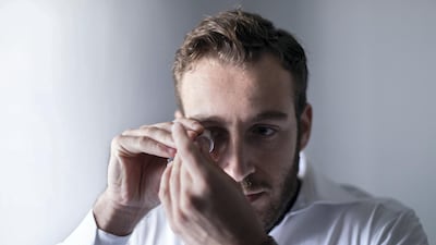 David Zabinsky, chief executive and founder of Trigem, examines a diamond at the company's workshop in Dubai. All photos by Reem Mohammed/The National
