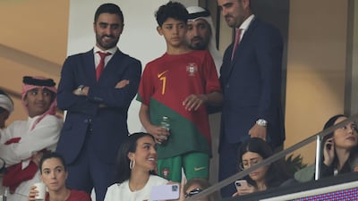 Rodriguez, bottom, and son Cristiano Ronaldo Jr, centre, attend the World Cup quarterfinal match between Morocco and Portugal at the Al-Thumama Stadium in Doha. AFP