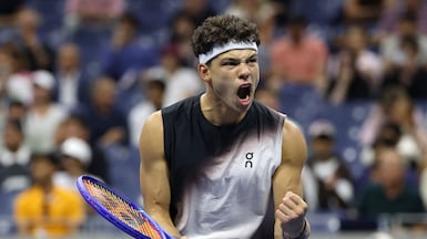 Ben Shelton celebrates after beating Carlos Alcaraz in their US Open quarter-final match. AFP
