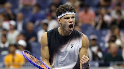 Ben Shelton celebrates after beating Carlos Alcaraz in their US Open quarter-final match. AFP