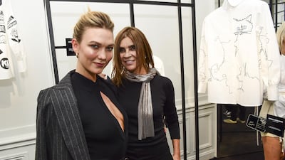 Karlie Kloss and Carine Roitfeld attend the Tribute to the Karl Lagerfeld: The White Shirt Project exhibition as part of Paris Fashion Week on September 25, 2019. Getty Images