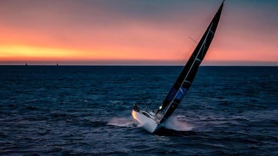 A yacht sails along the eastern coast of Tasmania, during the annual race between Sydney and Hobart. AFP