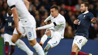 England’s Dele Alli scores against France. Andy Rain / EPA