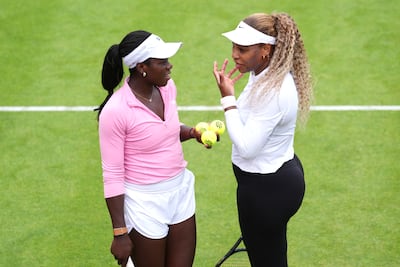 Serena Williams and Victoria Mboko at the Queen's Club in London. PA
