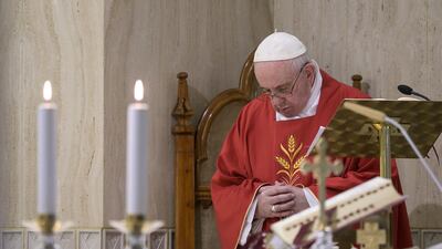 Pope Francis celebrates a morning mass broadcast live from the chapel of his Santa Marta residence in the Vatican on May 14, 2020. AFP