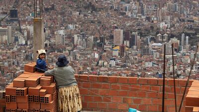A woman and a boy observe La Paz, Bolivia. Bolivia is called again to the polls on 18 October 2020 for the general election that was canceled October 2019, and then were postponed since May due to the COVID-19 pandemic. EPA