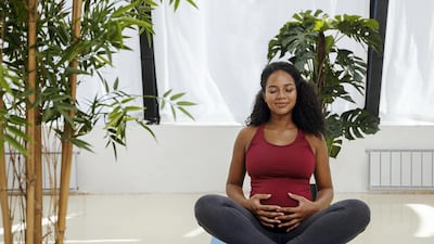 Prenatal yoga or Pilates is a great workout for expecting mums to do at home. Getty
